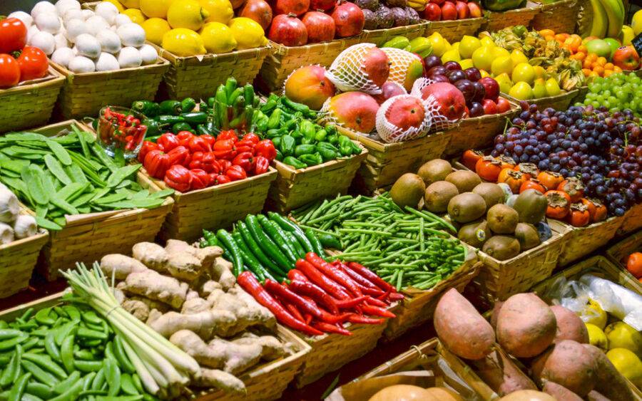 Rows of healthy fruits and vegetables at the local grocery store.