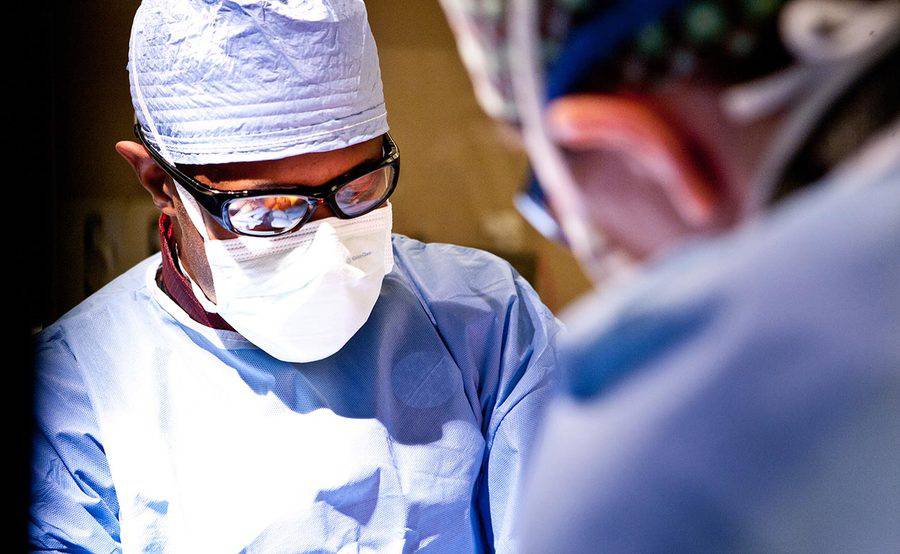 Two Scripps cardiac surgeons perform heart surgery.