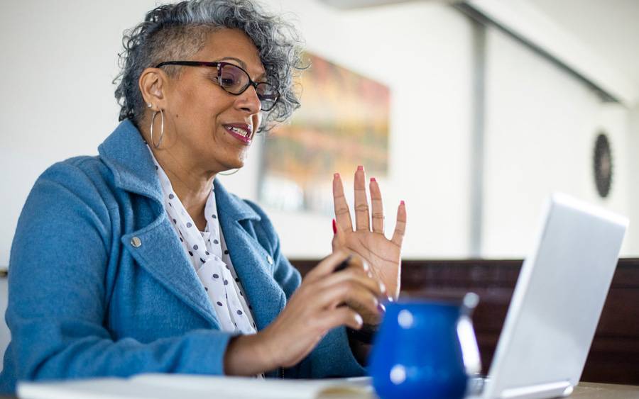 Woman attending online event