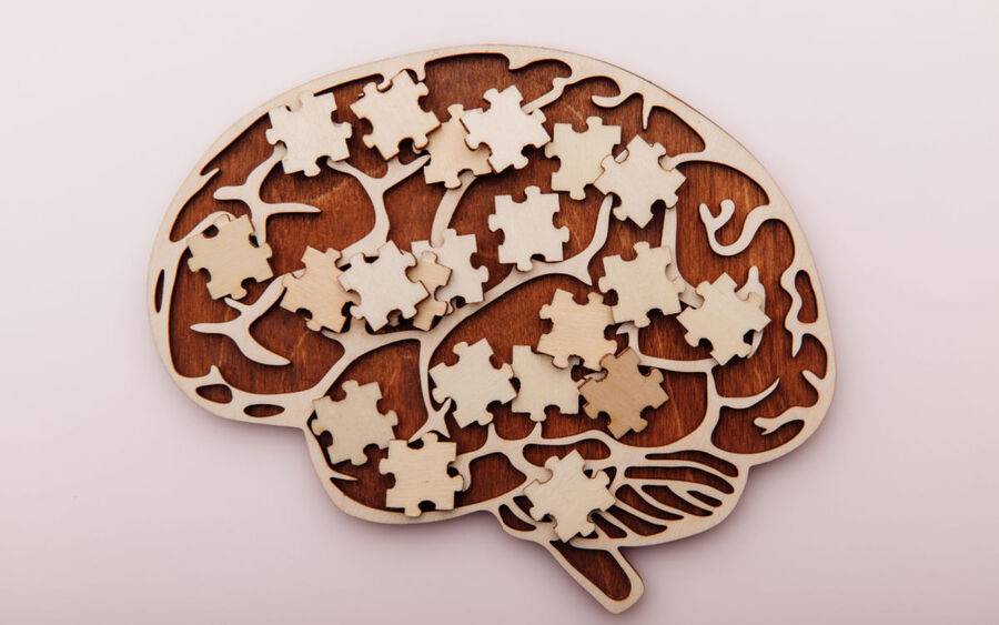 A graphic illustrating the effects of multiple sclerosis on the brain.