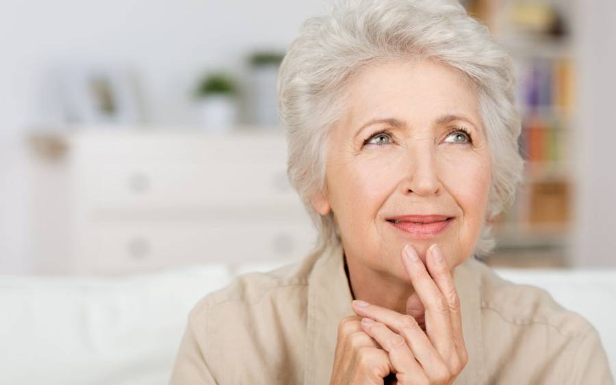 An older woman wonders if she has breast cancer after doing a self examination.
